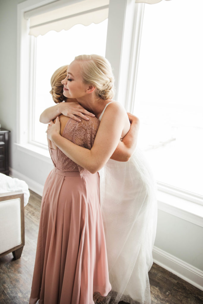 bride hugging her mother on wedding day at Myrtle Beach