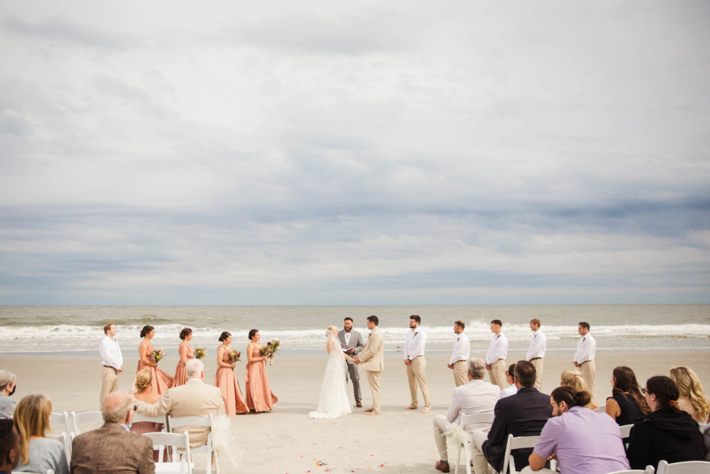 intimate beach ceremony with bride and groom marrying at Myrtle Beach wedding