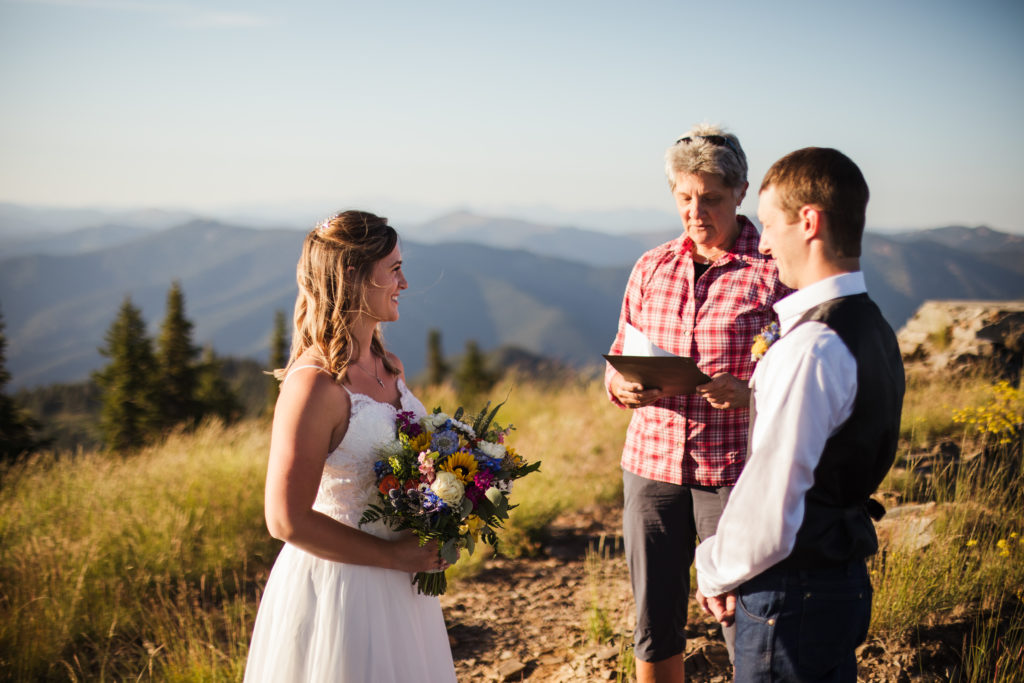 couple getting married during mountain top elopement 