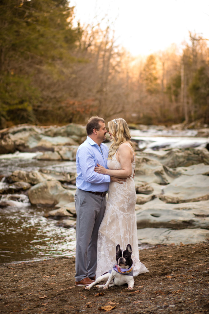 couple kissing in outdoor engagement session