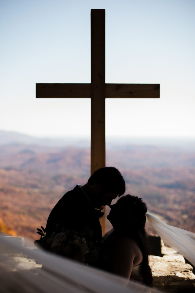 couple kissing after ceremony honeymoon where you elope in smoky mountains