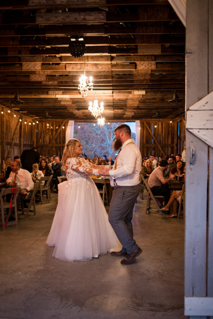Couple dancing inside their wedding venue at the wedding reception