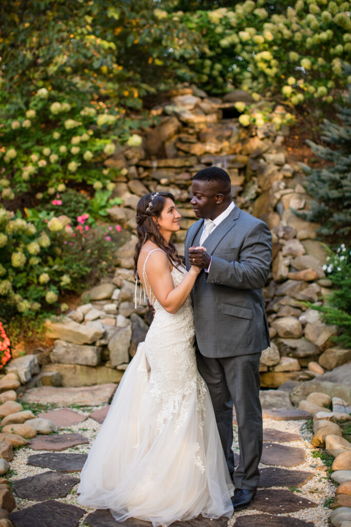 interracial couple dancing, bride and groom first dance