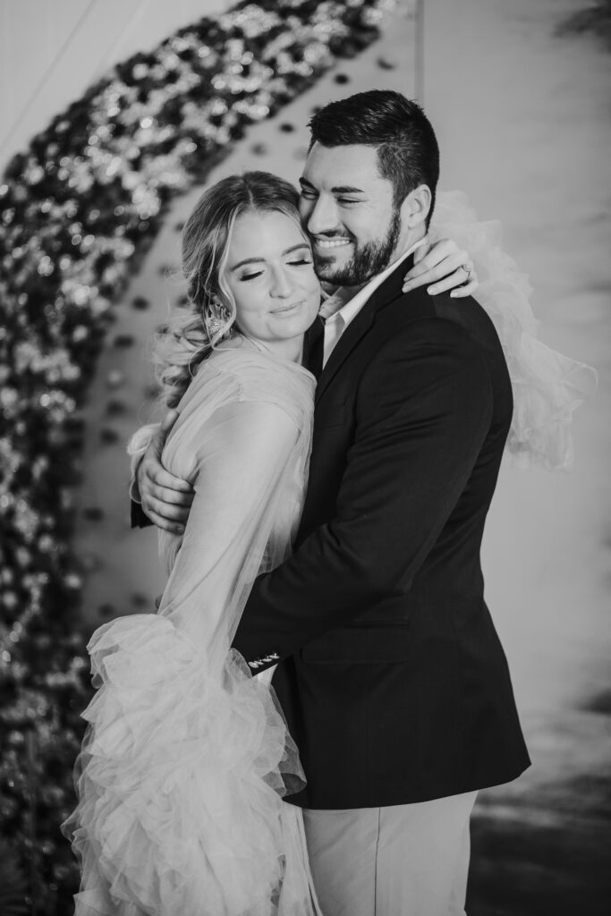 couple embracing, wedding photographer