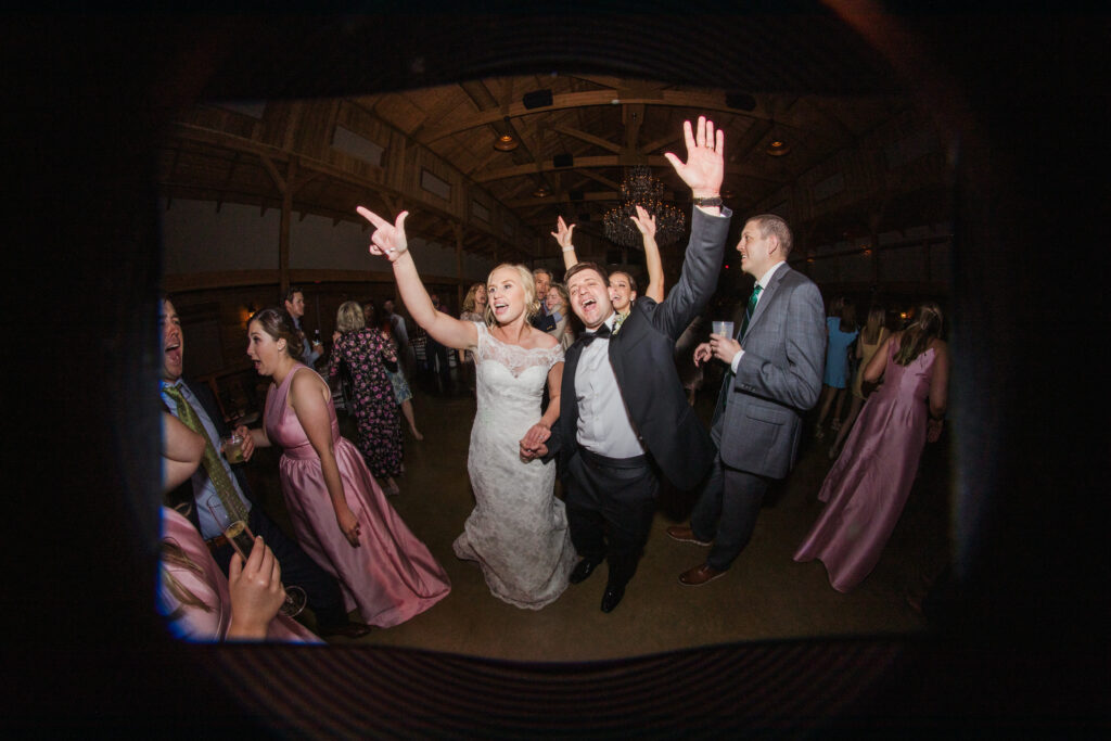 fisheye photo of bride and groom dancing